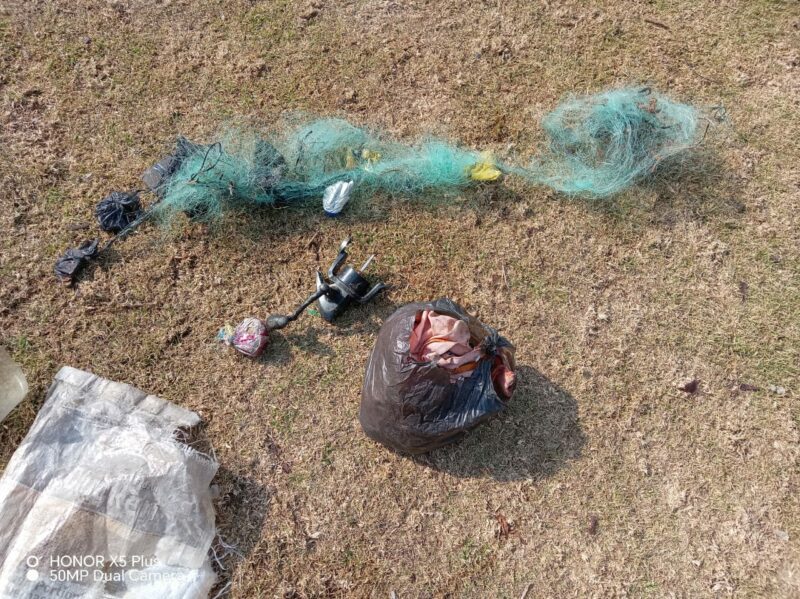 Illegal fishing equipment, including a gillnet, displayed after being confiscated near Lake Chrissiesmeer.