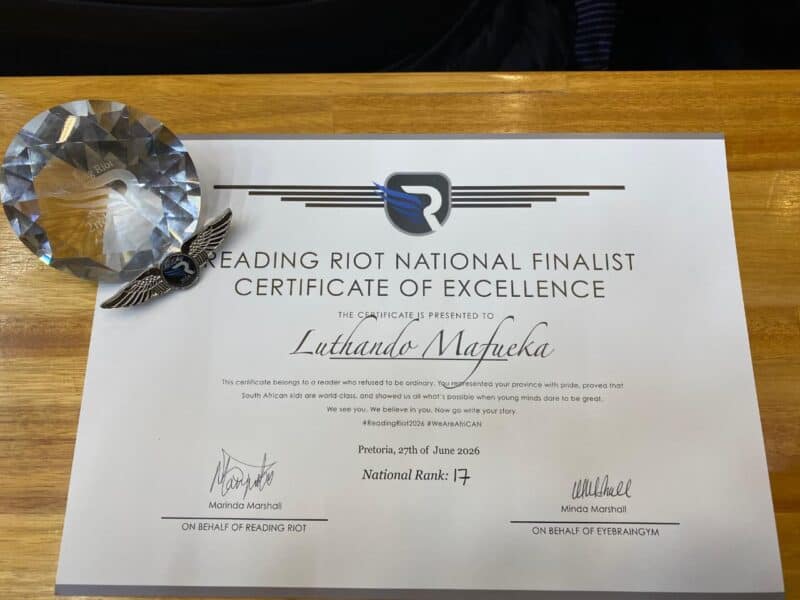 Luthando Mafueka's Reading Riot national finalist certificate of excellence and trophy.