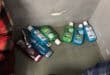 Several personal care products, including bottles of mouthwash, Satiskin products and a packaged toothbrush.