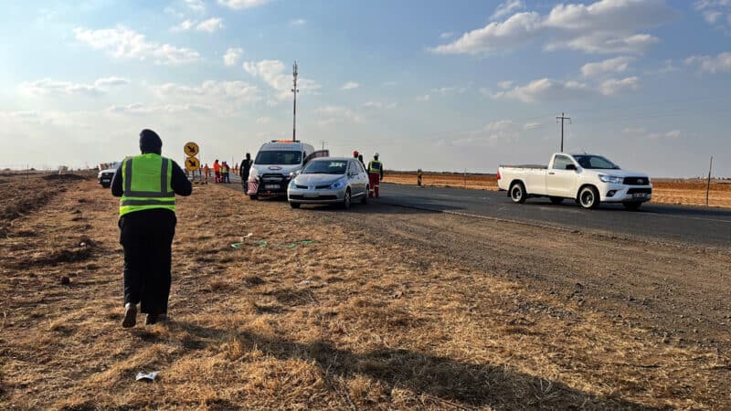 Emergency responders and vehicles at the scene of a collision on the N2 between Ermelo and Piet Retief.