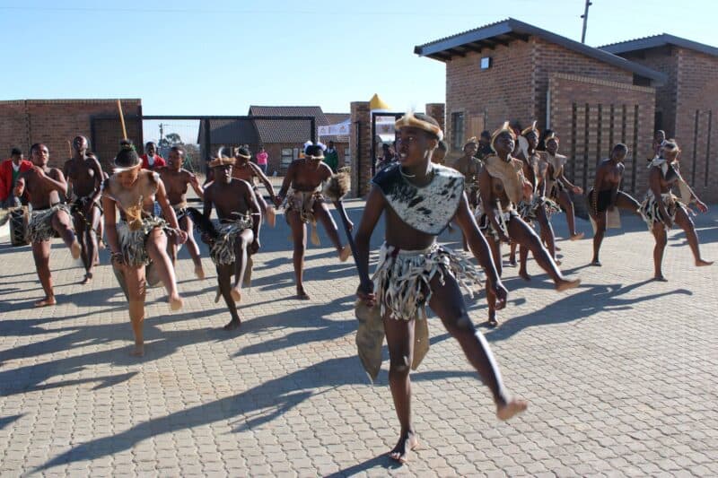 Traditional dancers perform during the Lucky Dube school handover ceremony in Ermelo