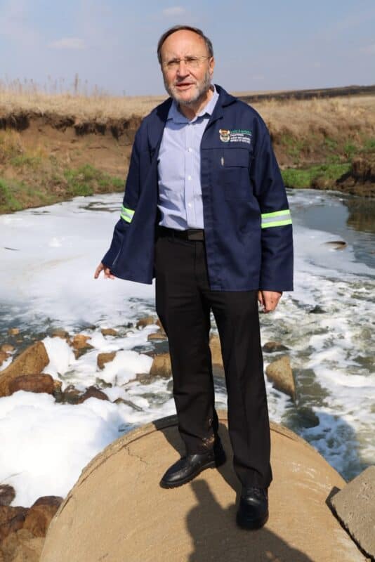 Deputy Minister Dr Jack Bloom inspects the polluted Klein Drinkwater stream near Ermelo.