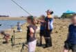CMR CYCC children try their hand at fishing at Ons Pan during a Bass Hub competition. Title: CMR CYCC children enjoy fishing day
