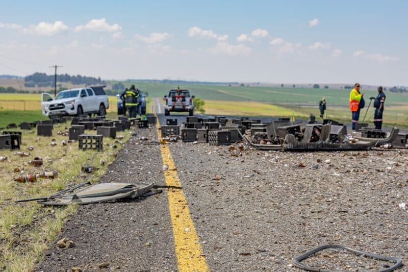 Beer crates, empty bottles and shattered glass cover the road between Ermelo and Morgenzon after an accident.