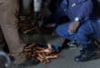 Recovered copper being weighed on an electronic scale during a theft bust