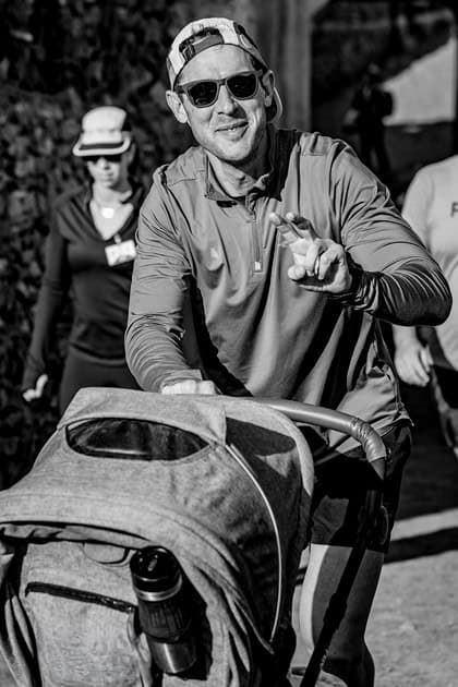 Tinus Taljaard participates in the Glen Aggy Trail Run with a small passenger along for the ride.