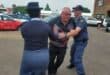 A man attempts to escape as two police officers apprehend him during a previous SANBS Jail and Bail Blood Drive in Ermelo.