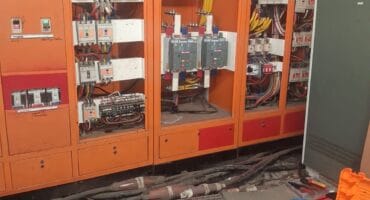Electrical equipment and open distribution panels during work at Ermelo Provincial Hospital.