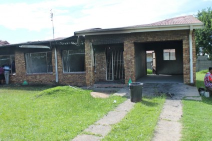 A woman died in this house after a fire.