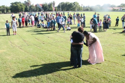 Teachers comfort children at Laerskool Oranjegloed Primary School after the school got a bomb threat on Tuesday, 3 February.