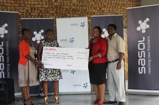 From left are Elda Mahlangu (Social Work Office Manager, eMbalenhle), Ms Mashudu Ndou (Senior Manager for Sasol Secunda Community Affairs), Ms Catherine Magodi (OVC Programme Manager, FAMSA Secunda), and Mr Johannes Nkosi (Sasol Community Recreational Centre Manager, eMbalenhle) during the funding handover by Sasol.