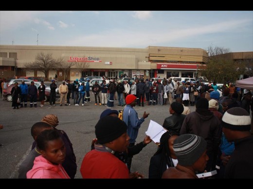 People standing in queues to get assistance at the SARS mobile unit on Wednesday, 1 July.