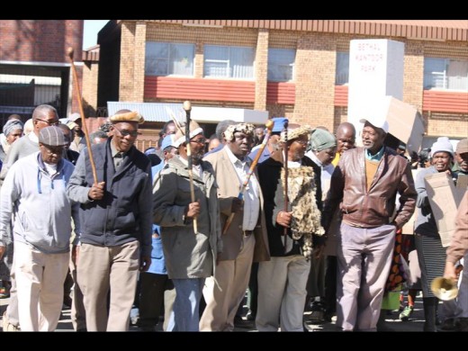 Traditional leaders outside the municipal offices.