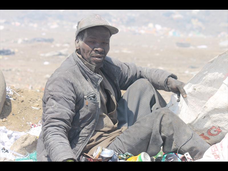 Mr David Bangwa has been living at the eMzinoni dumping site for over a decade.