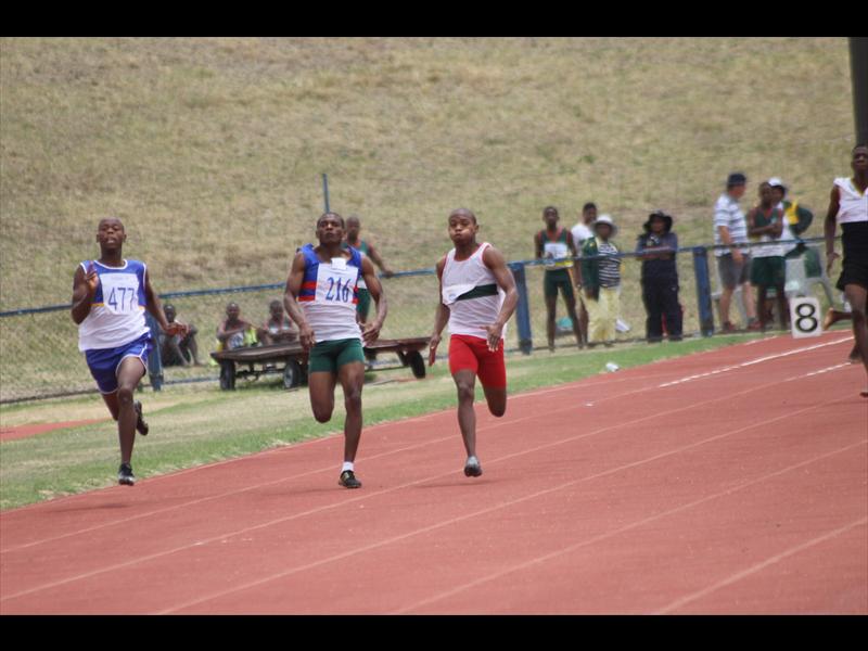 Siyavuya Ngxalive, Junior Makhubo and Ishmael Legodi during the 200 metres athletics event at the Lilian Ngoyi Stadium during the SASAII Games.