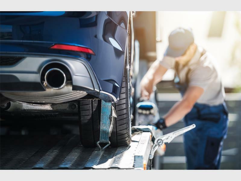 mechanic working on a car