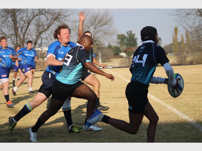 Rugby players in action during a game.