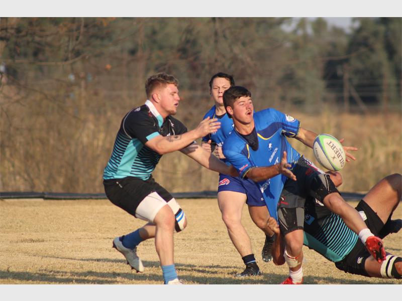 Rugby players in action during a game.