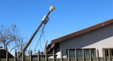 A pole with a light on top of it.