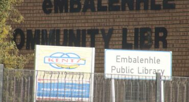 A sign that says e malbenele community library.