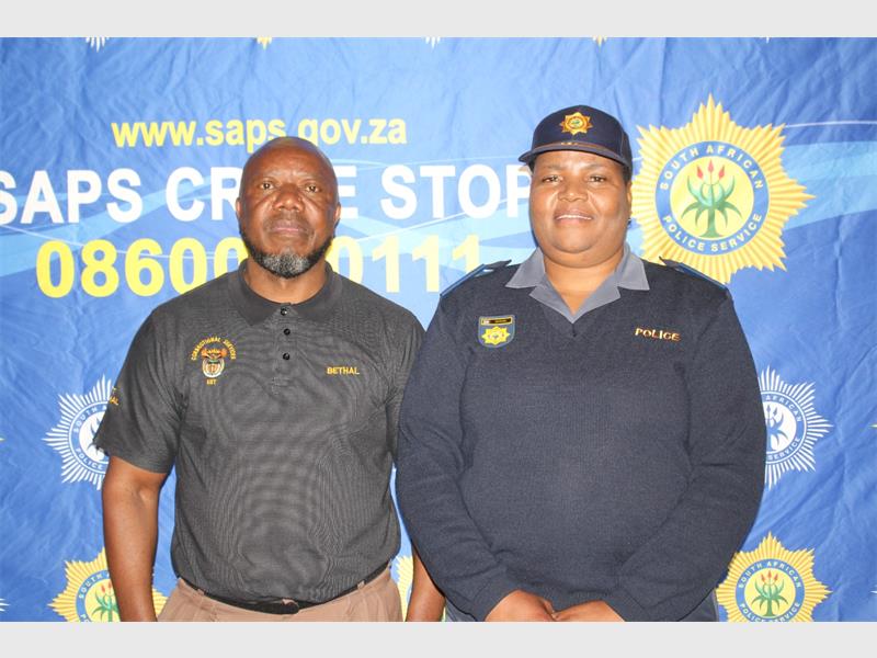 Two men in uniform standing next to each other.