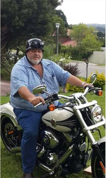 Big man on motorbike