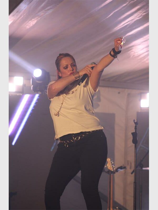 A woman performs on stage