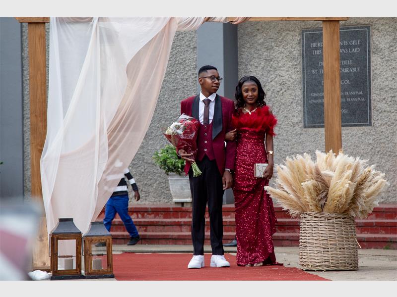 Couple dressed in red.