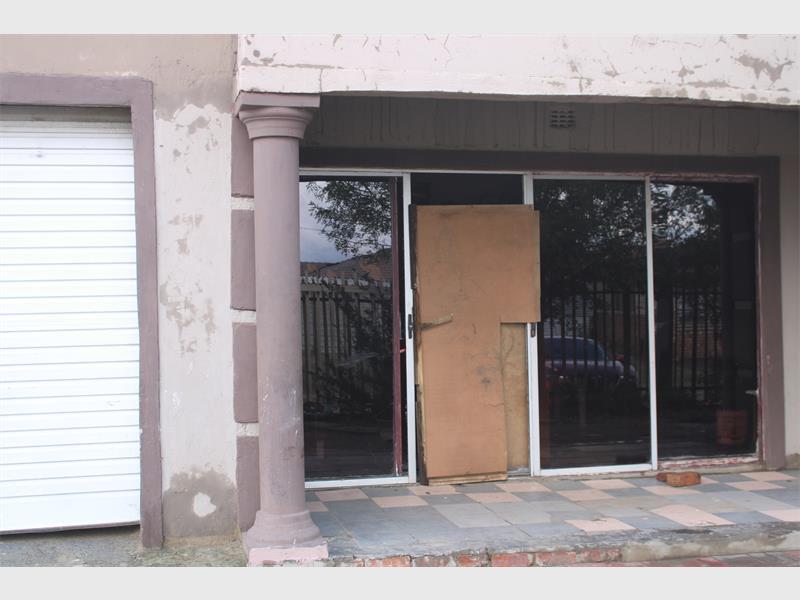 House with a boxed up door