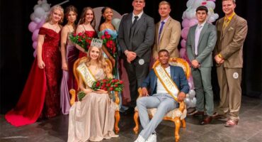 group of teenagers in evening wear