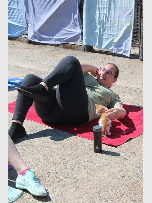 a woman with a kitten