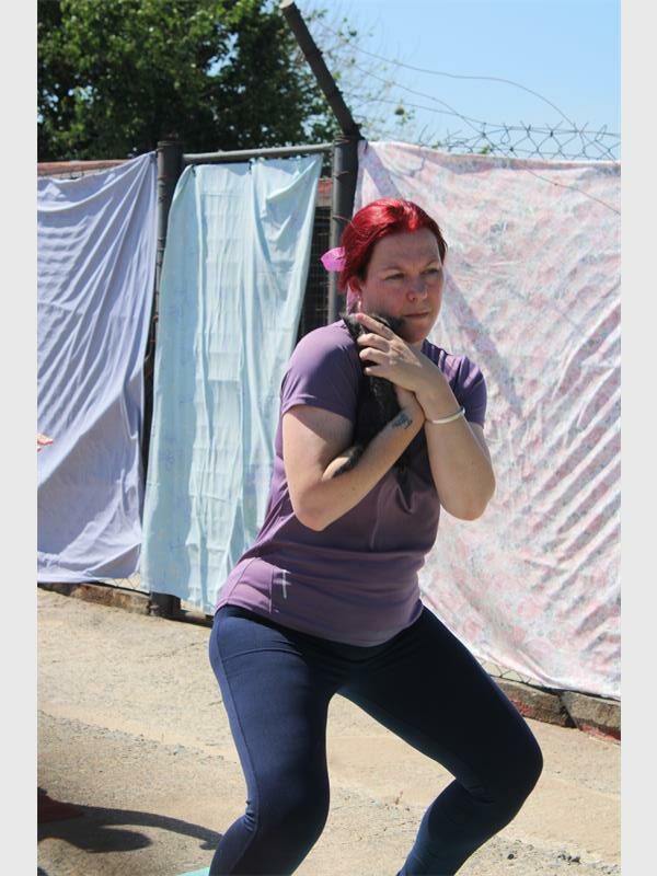 a woman with a kitten