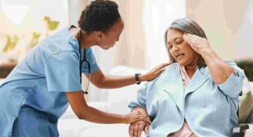 nurse checking on patient