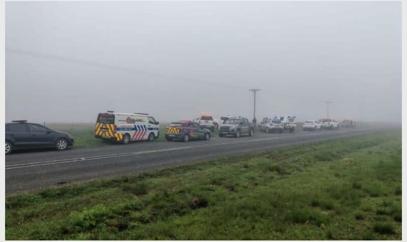 emergency vehicles in the mist