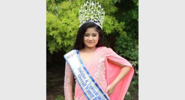 little girl with big crown