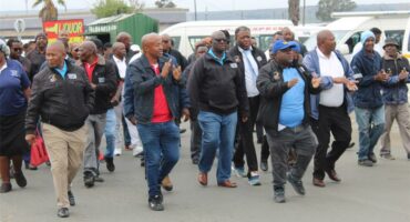 people marching in the street