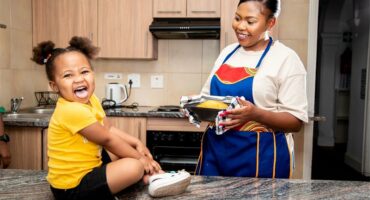 A mother with a laughing baby.