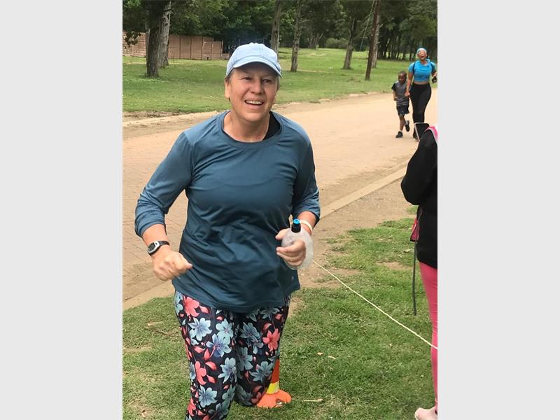 elderly woman in flowery pants