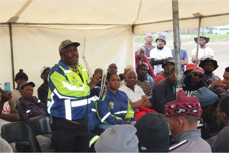 man in cpf reflector jacket