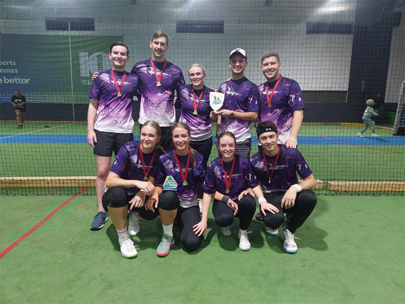 sports team with purple shirts