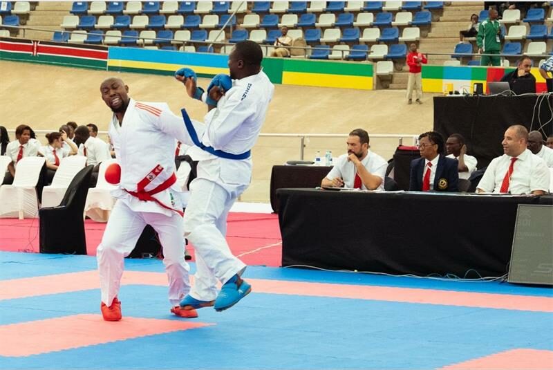 Two karate fighters in combat