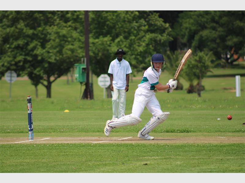 A junior batsman runs