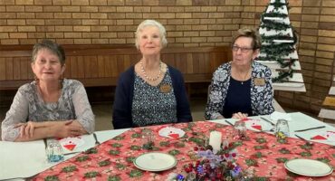 three women at a table