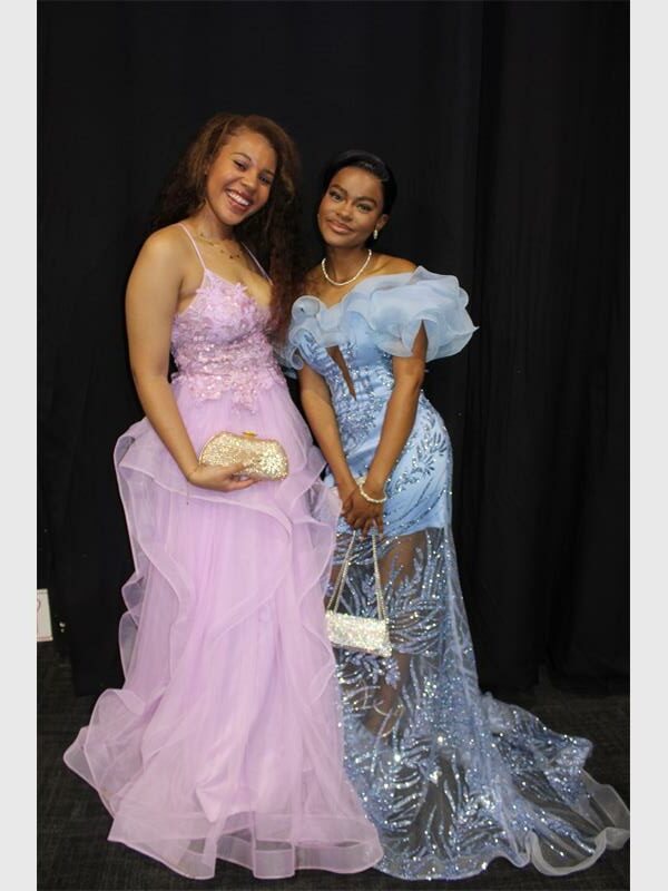 two girls in beautiful dresses