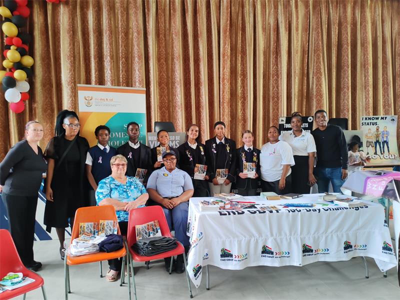 group of people and learners with trophies