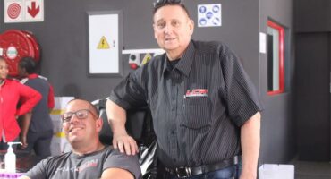 two men donating blood