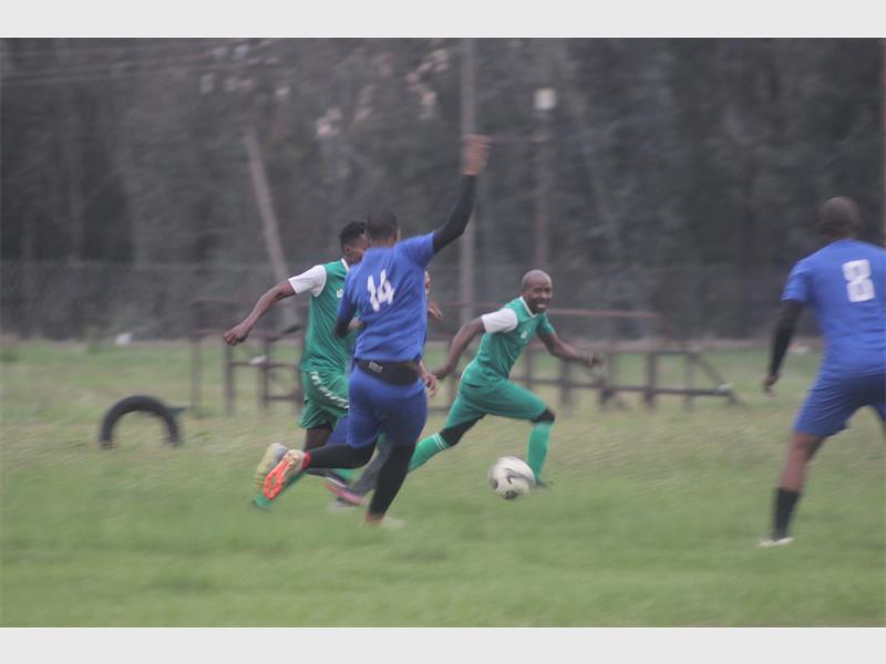 Master Villa player kicks the ball.