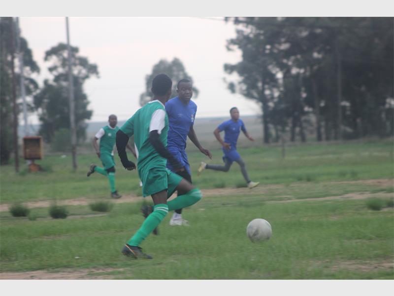 Description: Superspar and Master Villa go after the ball.