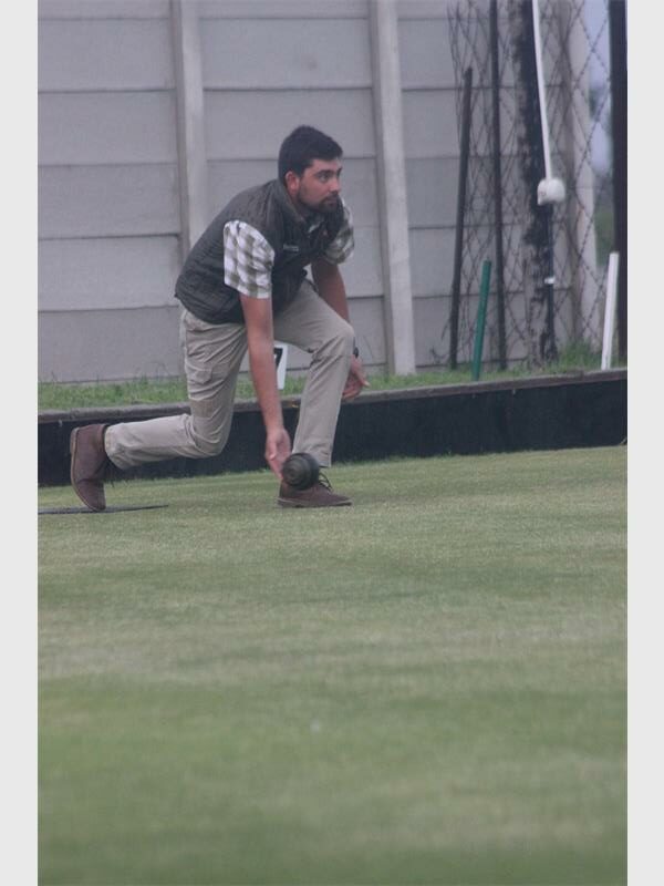 Bowler rolling.