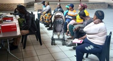 people sitting in a row